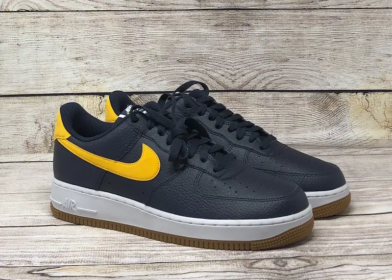 yellow and navy blue nikes